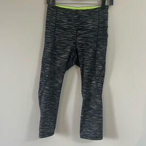 Black and grey striped capri yoga pants